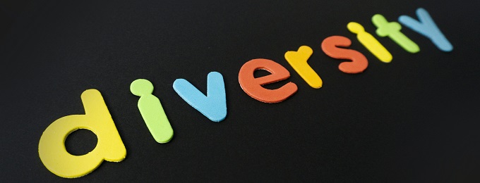 Black background with the word diversity written in multi coloured foam lettering 